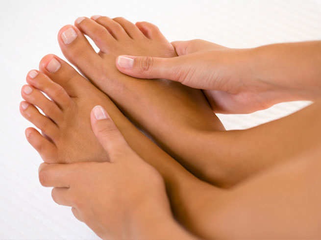 Sesame oil feet massage