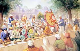 Sitting in the pangat to eat Akbar's Guru-langar …..
