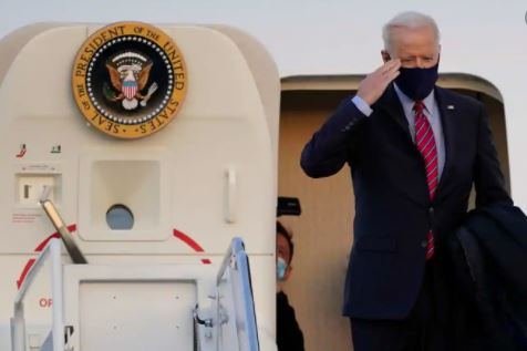President Joe Biden slips