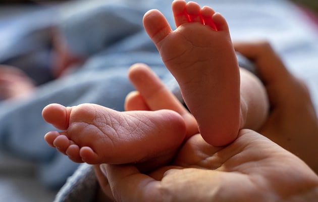 South African woman gives birth