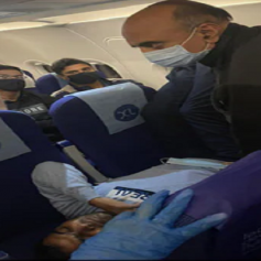 minister treated sick patient in flight
