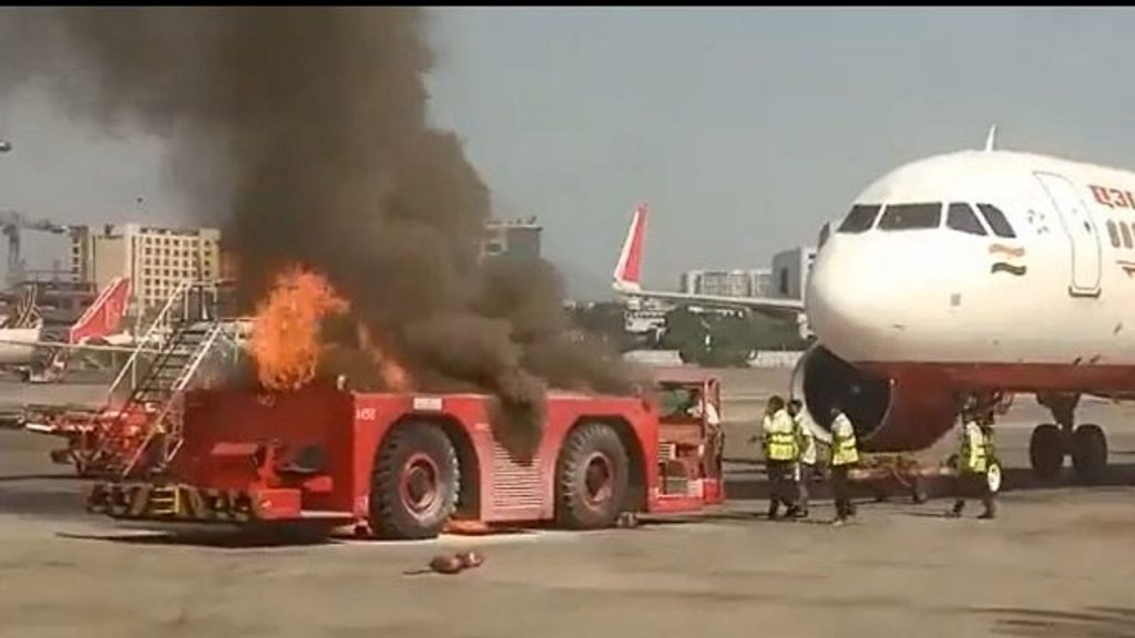 tow van catches fire at mumbai airport