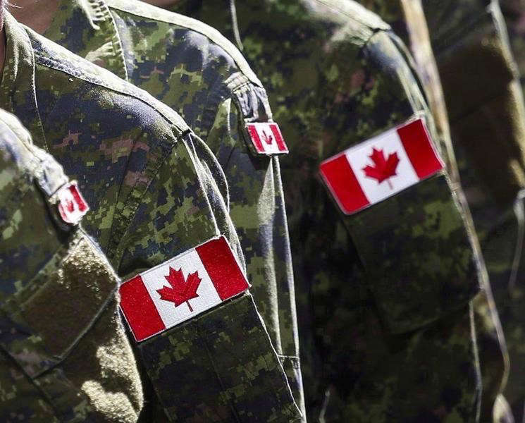 Canadian military cuts dozens