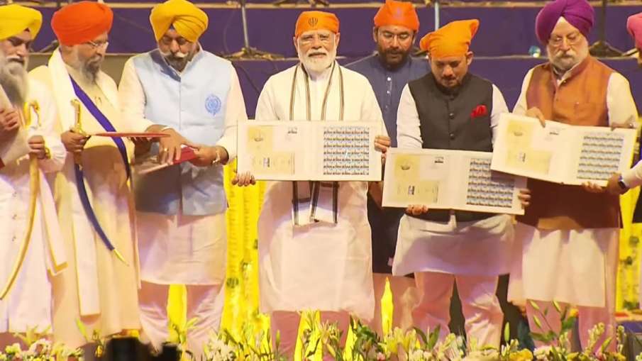 PM Modi releases coin and stamp