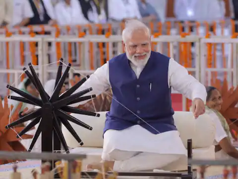 PM Modi spins wheel 