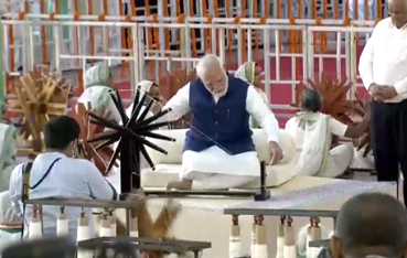 PM Modi spins wheel 