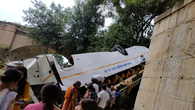 Bus fell down into 