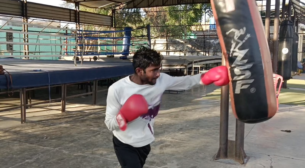 Gold medalist boxer sweeping 