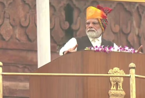 PM Modi in saffron colored