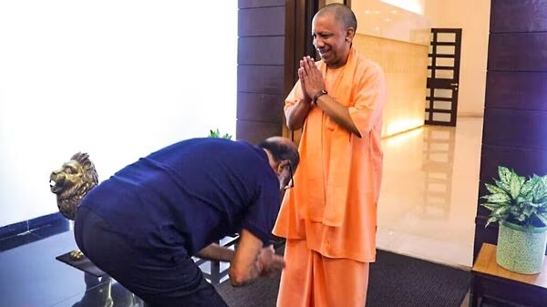 Rajinikanth touches CmYogi Feet